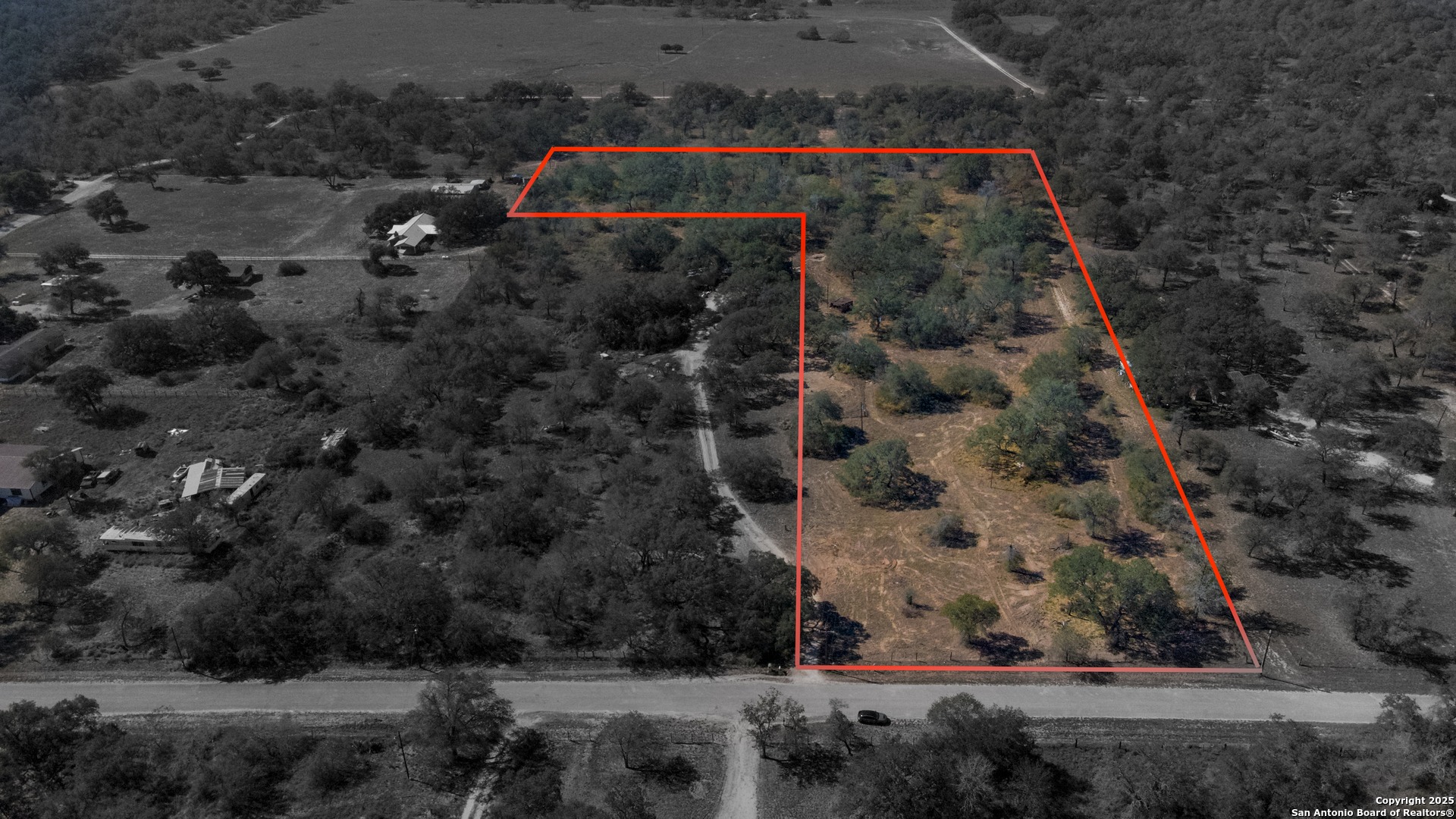 Aerial view of the Enchanted Drive property with an outlined tract